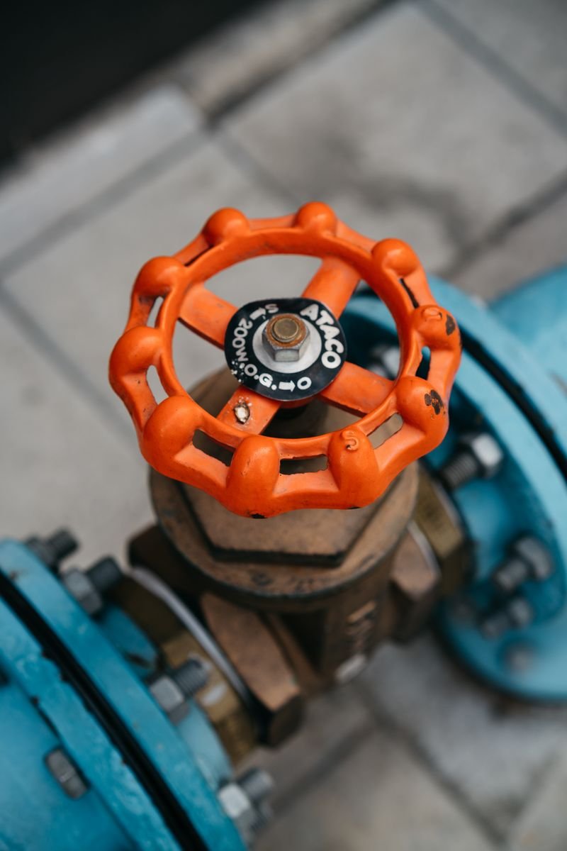 Industrial control valve on pipeline representing HVAC control systems