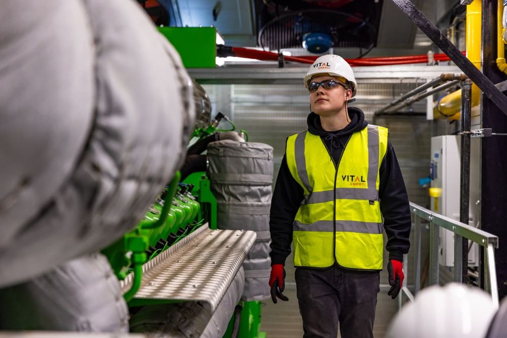 Engineer inspecting industrial piping system