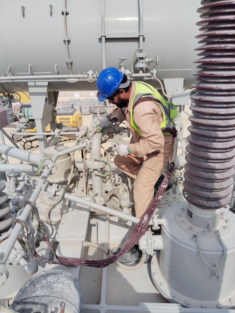 Engineer inspecting piping and pressure equipment