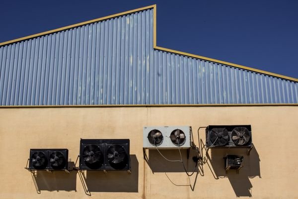 Air filtration equipment installed on industrial building wall