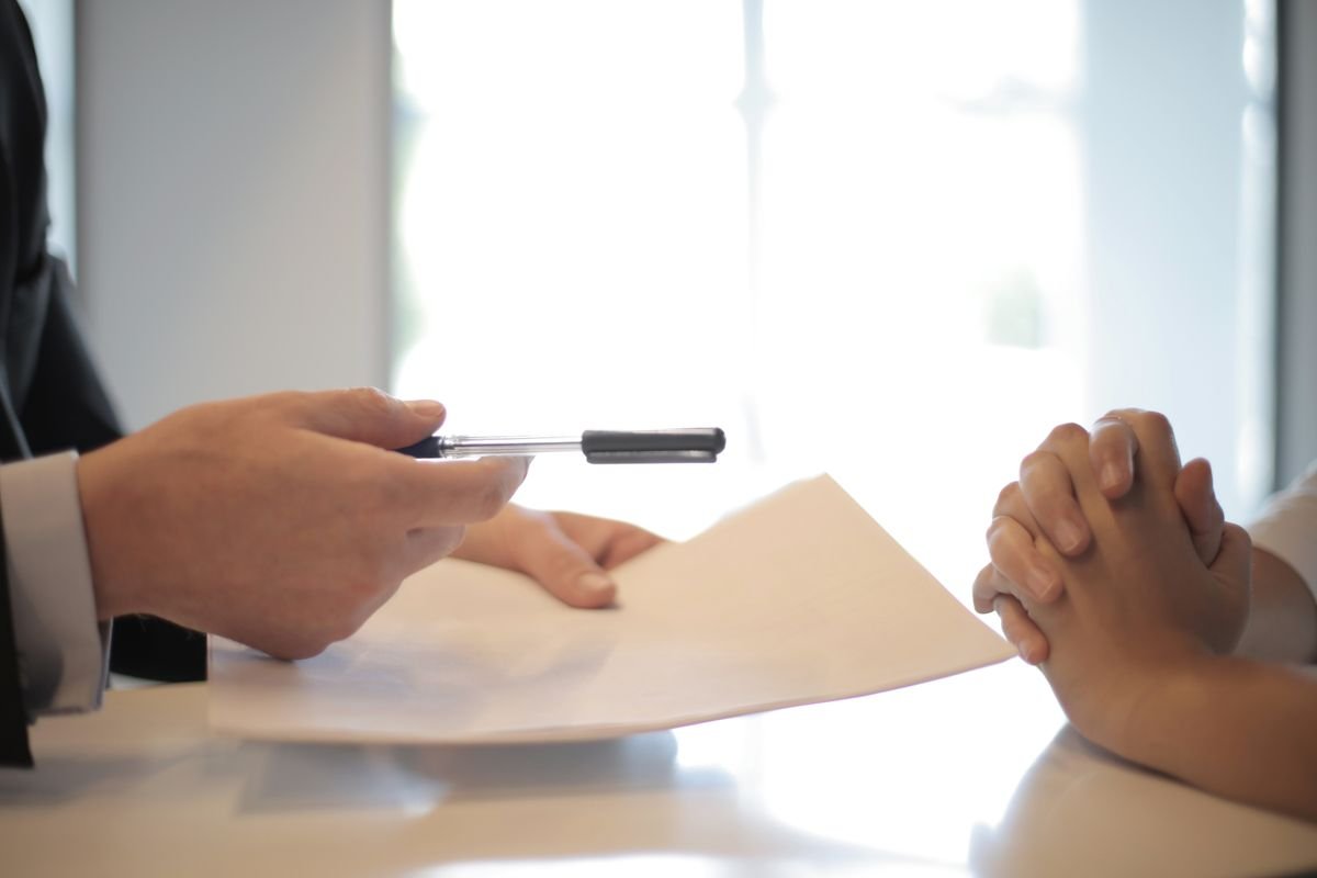 Commercial documents being reviewed and signed