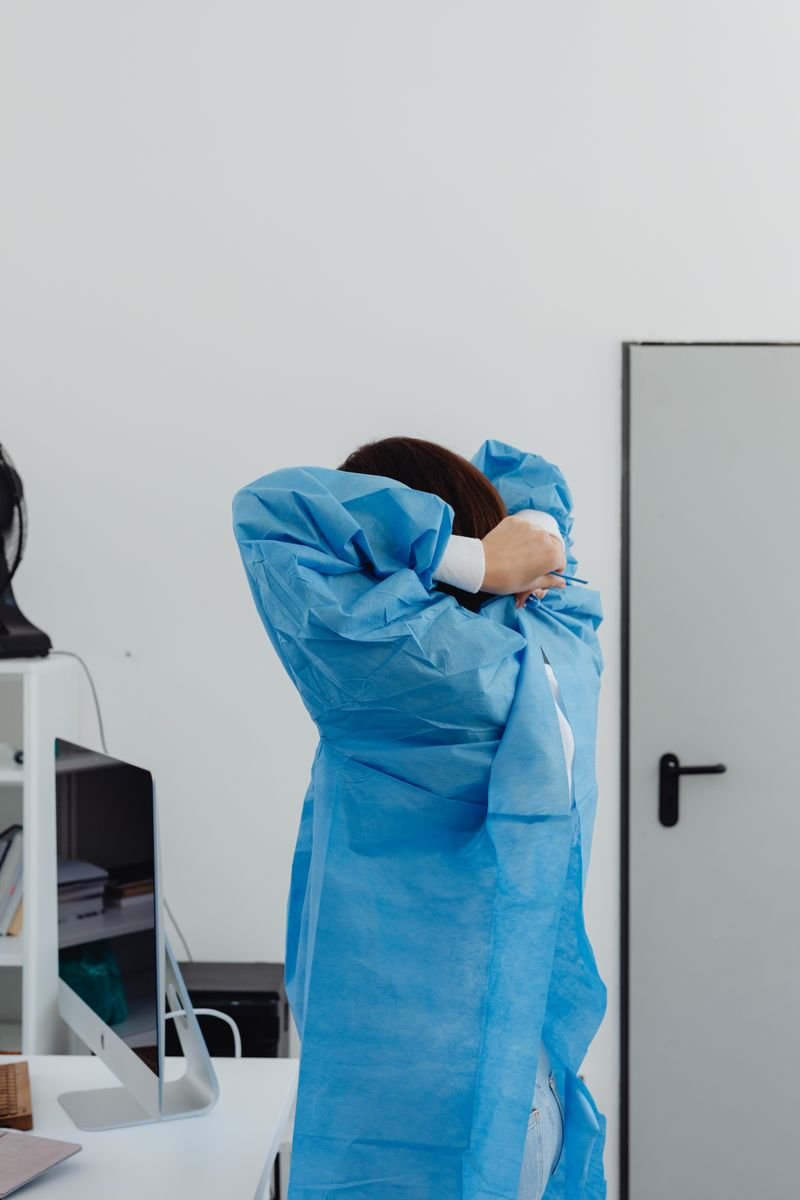 Technician in cleanroom for filtration testing